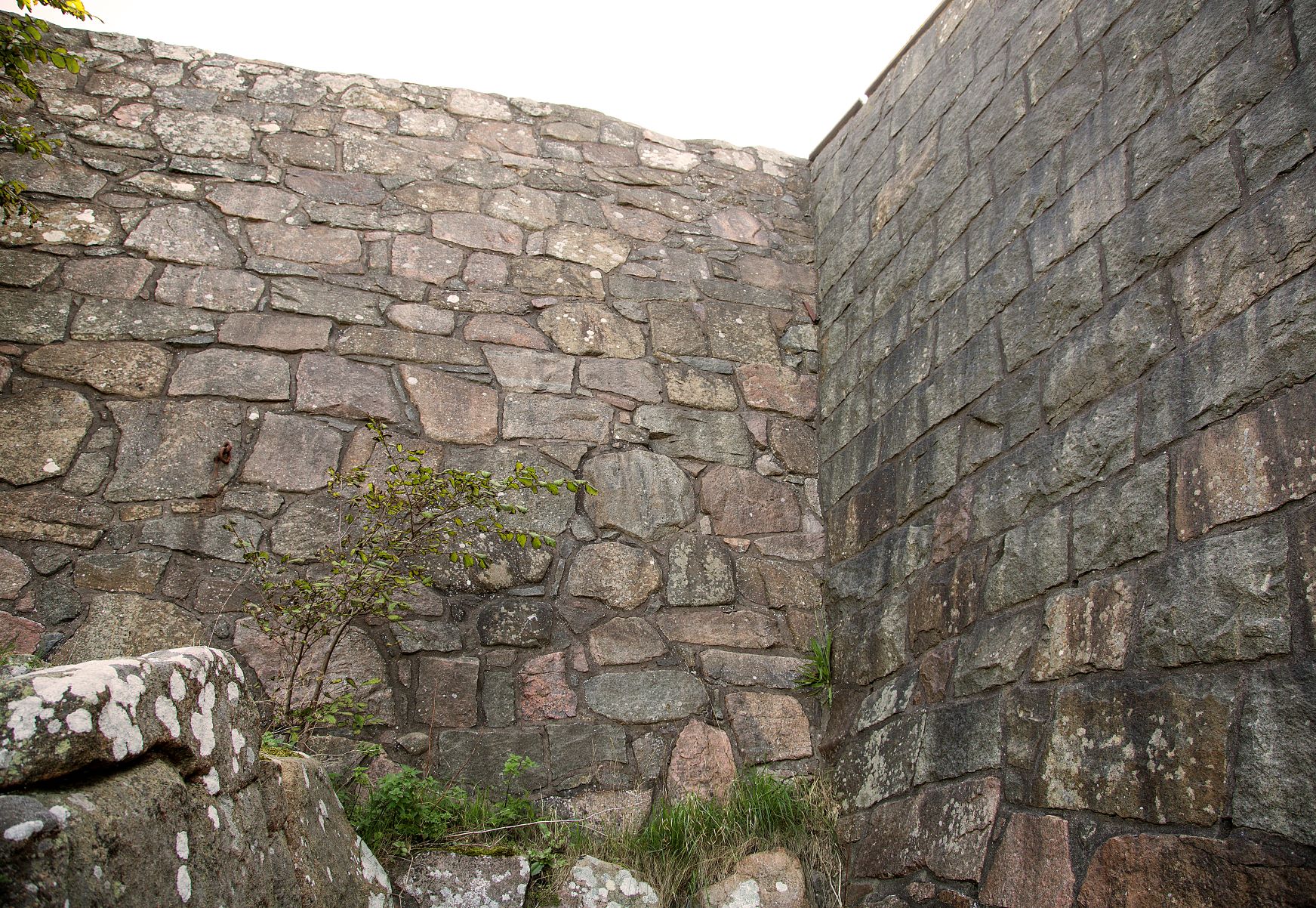 This wall on the west side of the fortress clearly shows the difference between the original wall on the left and a restored wall from the 20th century on the right.